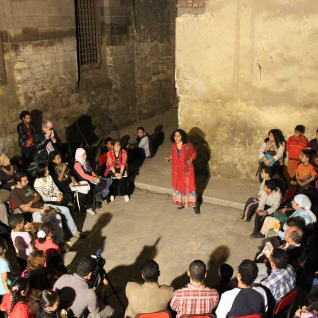 Photo of Chirine El Ansary performing to a crowd