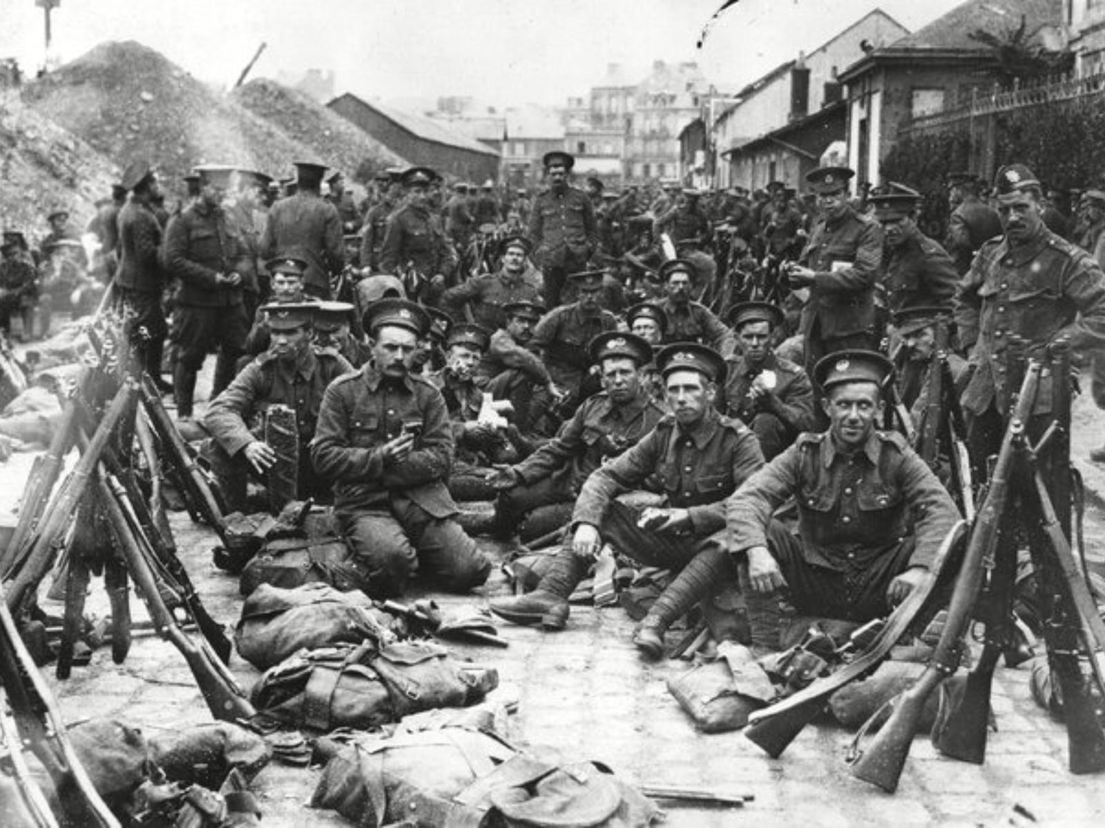 Soldiers sitting for a photo in the Belgian city of Mons
