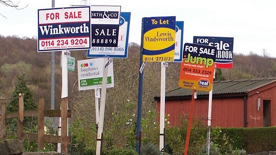 House for sale signs