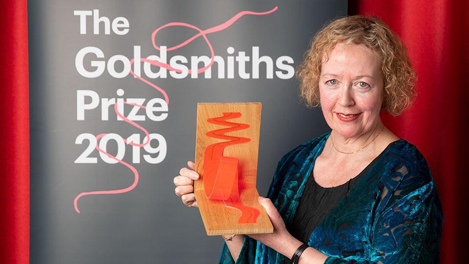 Lucy Ellman holding the Goldsmiths Prize at the 2019 award ceremony 