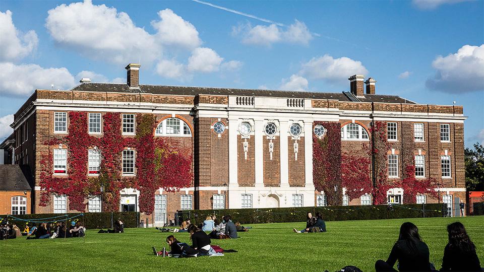 Students on the lawn of Richard Hoggart Building