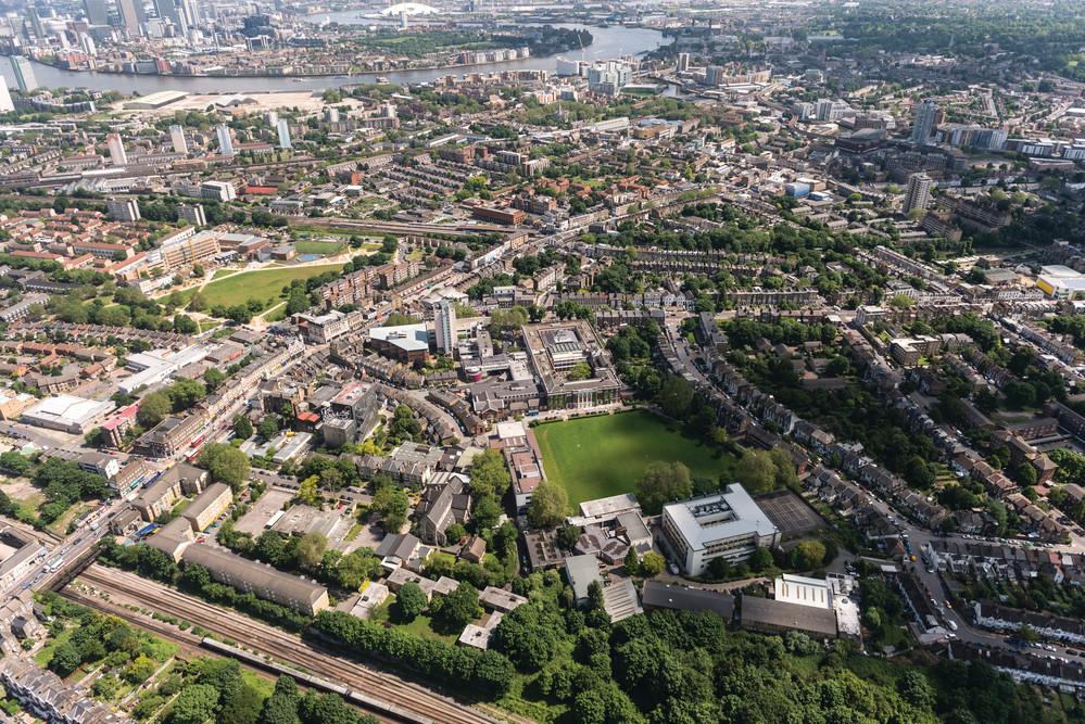 Aerial view of Goldsmiths campus, extending to the river Thames.
