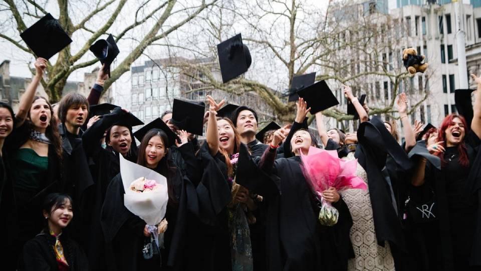 Students celebrate their graduation in Westminster
