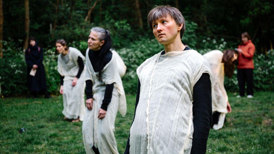 Shrouded performers wither and bloom