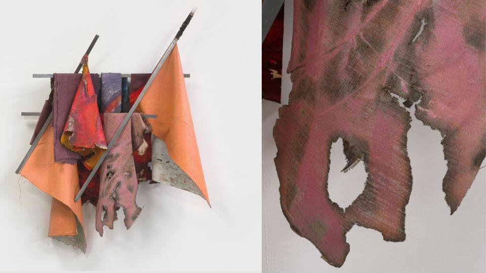 Abstract wall-mounted assemblage by Roland Knowlden Jr. made from painted and scorched fabric, metal and mixed materials.