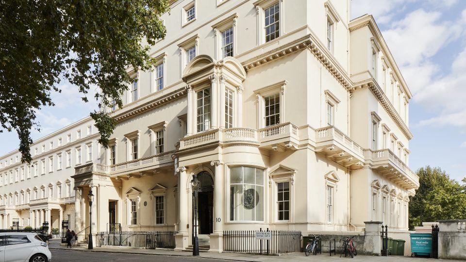 The British Academy exterior, Carlton House Terrace, a large white building 