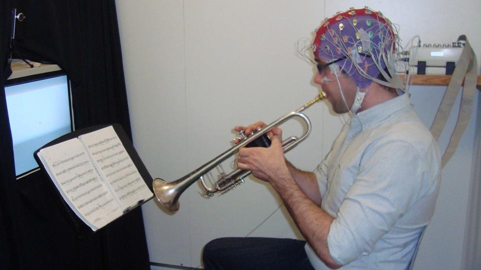 A participant from the study playing flow-inducing music 