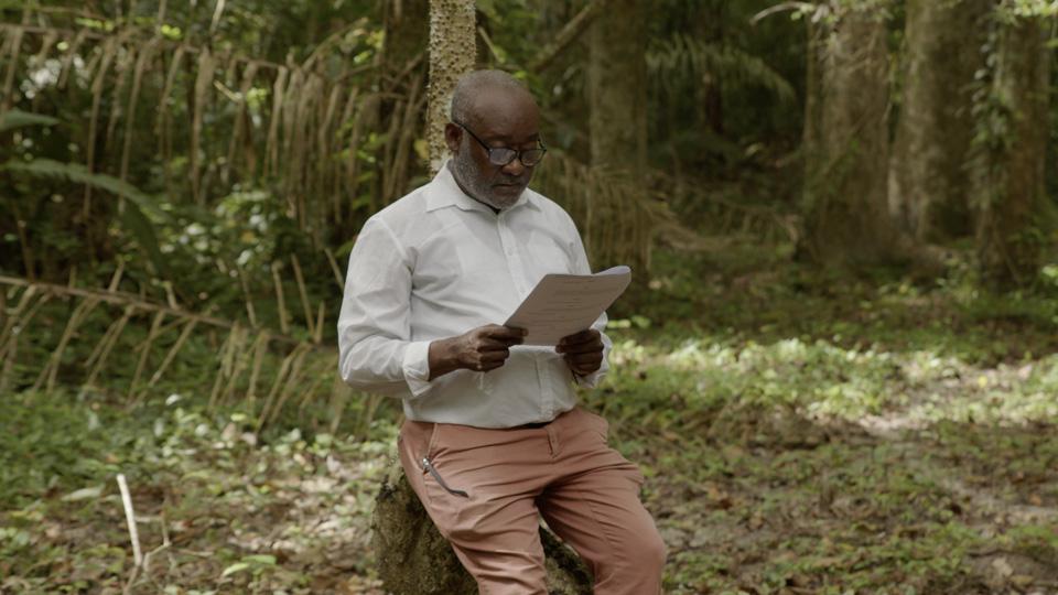 Russell Lancaster reading Wilson Harris's The Secret Ladder at the ruins of Fort Nassau