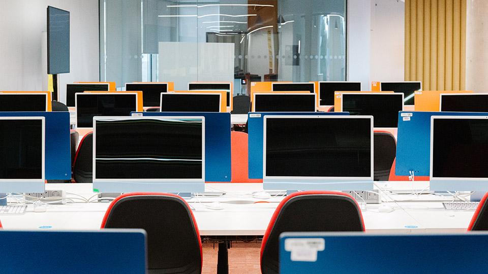 Rows of computers in the CGB Computing Suite