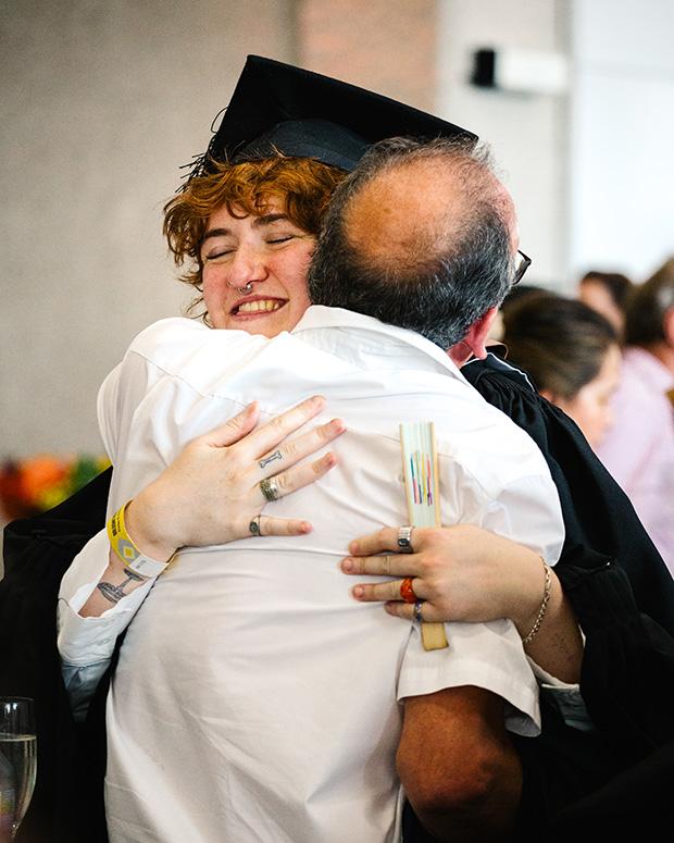 A grad gets a big hug