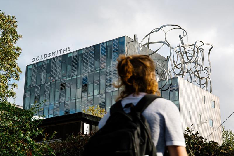 Student looking up at the Ben Pimlott Building