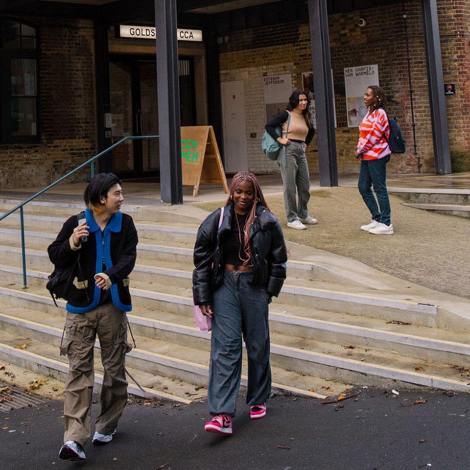 Students walking and chatting on campus