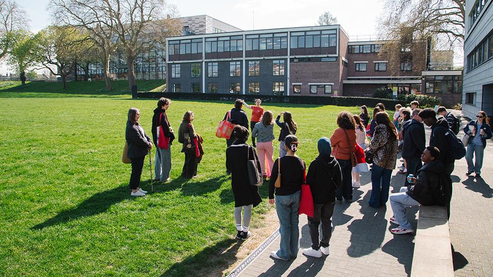 Students and staff outside the Richard Hoggart Building at an open day