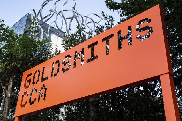 An orange sign for Goldsmiths CCA, the on-campus public art gallery.